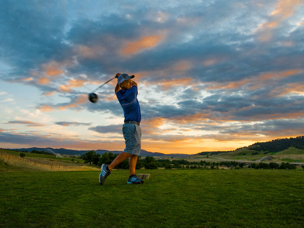golfer at sunset