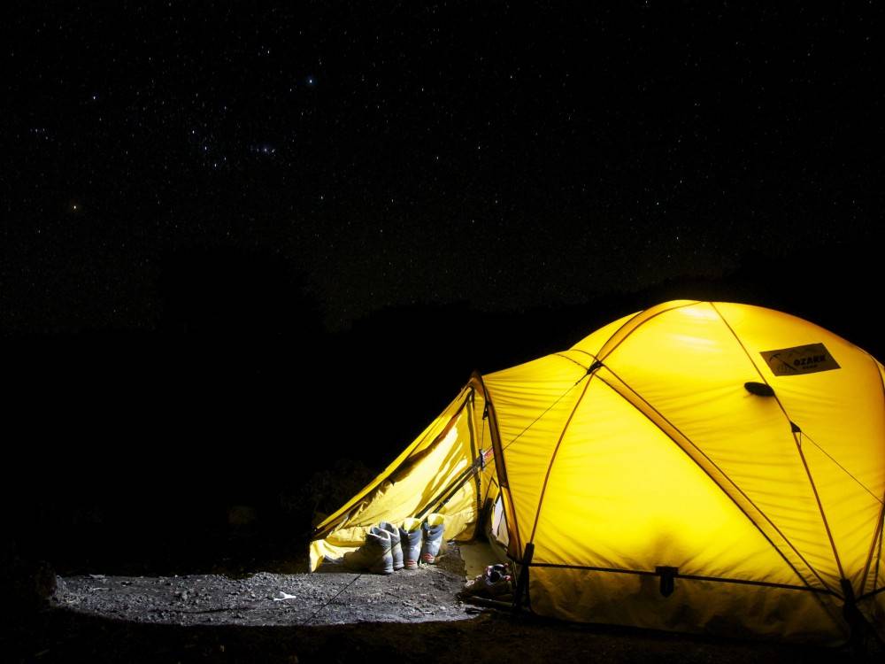 yellow tent at night